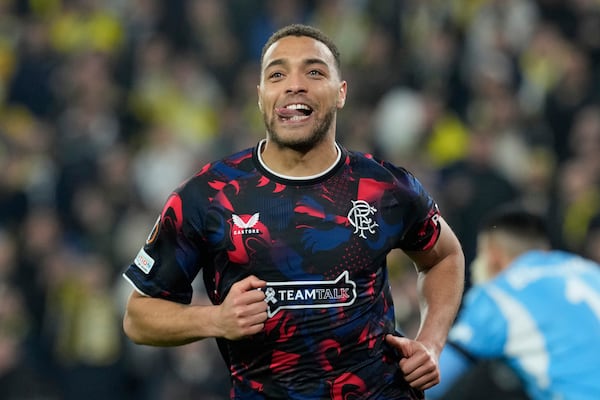 Rangers' Cyriel Dessers celebrates after scoring his side's second goal, which was disallowed during the Europa League round of 16 first leg soccer match between Fenerbahce and Rangers at Sukru Saracoglu stadium in Istanbul, Turkey, Thursday, March 6, 2025. (AP Photo/Khalil Hamra)