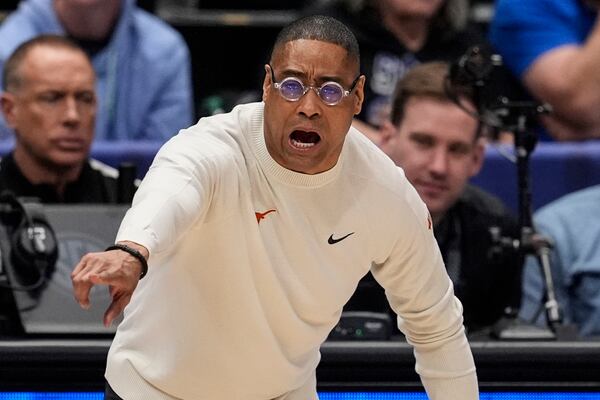 Texas head coach Rodney Terry speaks during the second half of an NCAA college basketball game at the Southeastern Conference tournament against Vanderbilt, Wednesday, March 12, 2025, in Nashville, Tenn. (AP Photo/George Walker IV)