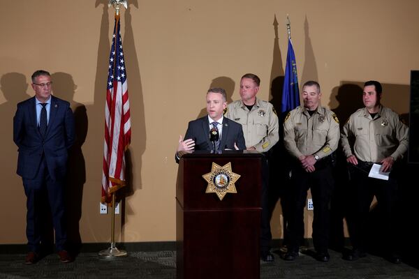 Spencer Evans, special agent in charge of the FBI's Las Vegas division, speaks at Metropolitan Police Department headquarters in Las Vegas Tuesday, Jan. 7, 2025, regarding a Tesla Cybertruck that exploded at the Trump International Hotel. Looking on from left are Bureau of Alcohol, Tobacco, Firearms and Explosives Special Agent in Charge San Francisco Division Kenny Cooper, Sheriff Kevin McMahill, Undersheriff Andrew Walsh and Assistant Sheriff Dori Koren. (K.M. Cannon/Las Vegas Review-Journal via AP)