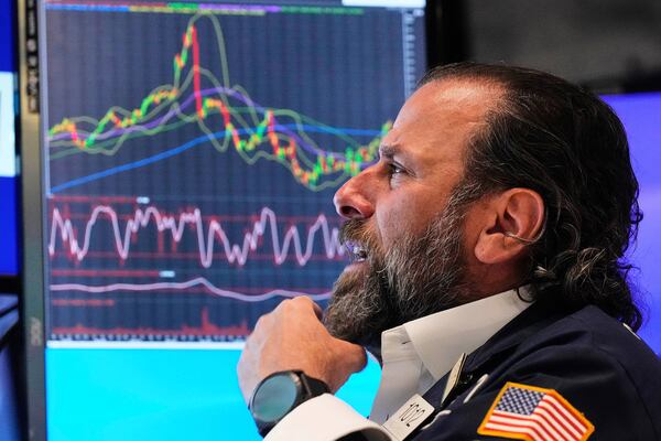 Specialist Michael Pistillo works at his post on the floor of the New York Stock Exchange, Monday, May 12, 2025. (AP Photo/Richard Drew)