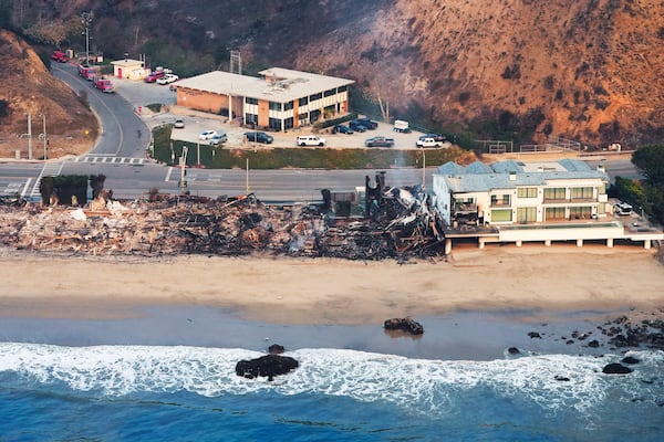 Beach front properties are left destroyed by the Palisades Fire, in this aerial view, Thursday, Jan. 9, 2025 in Malibu, Calif. (AP Photo/Mark J. Terrill)