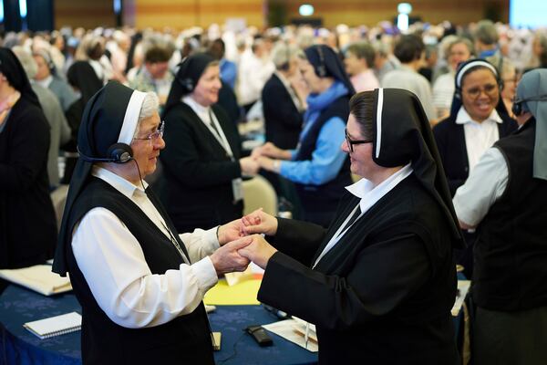 Nuns pray during a congress of nearly 900 superiors of the world's female religious orders in Rome, Monday, May 5, 2025. (AP Photo/Alessandra Tarantino)