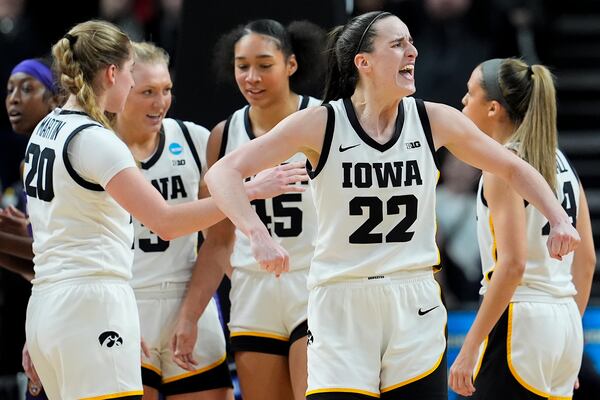 FILE - Iowa guard Caitlin Clark (22) reacts during the fourth quarter against LSU during the NCAA tournament, Monday, April 1, 2024, in Albany, N.Y. (AP Photo/Mary Altaffer, File)