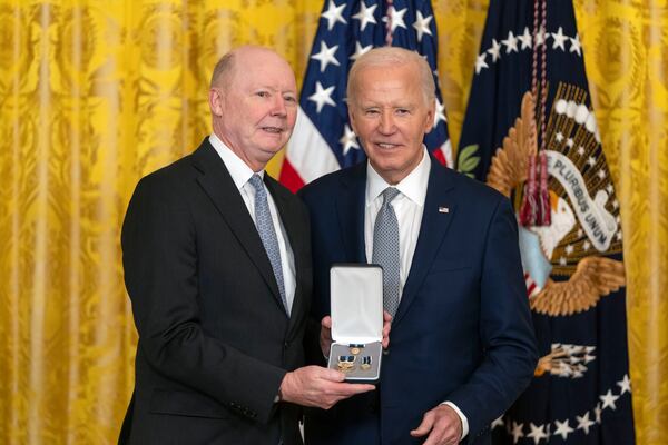 President Joe Biden awards the Presidential Citizens Medal to Collins Seitz, Jr., on behalf of Collins Seitz during a ceremony in the East Room at the White House, Thursday, Jan. 2, 2025, in Washington. (AP Photo/Mark Schiefelbein)