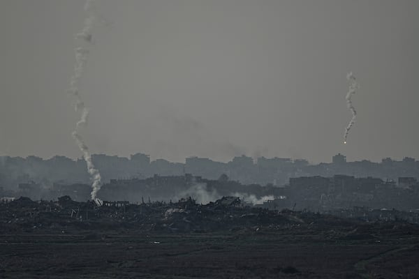 An Israeli army flare is seen over the Gaza Strip, as seen from Sderot, southern Israel, Monday, Jan. 6, 2025. (AP Photo/Tsafrir Abayov)