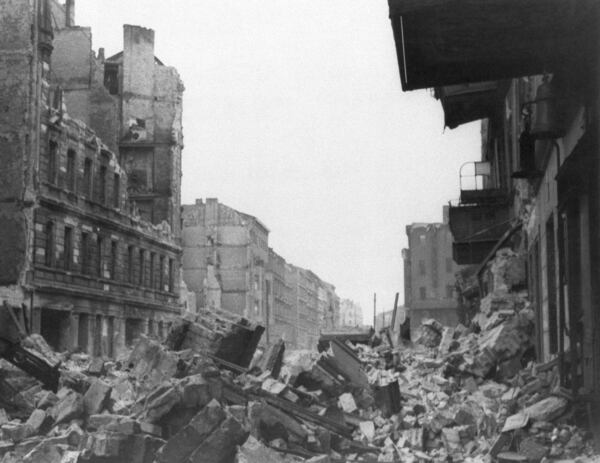 FILE - Wreckage and debris fill Frankfurter Allee near Lasdehner Strasse in a working district in the eastern section of Berlin on July 31, 1945, following an allied aerial attack on Feb. 26, 1945, prior to the fall of the city. (AP Photo, File)