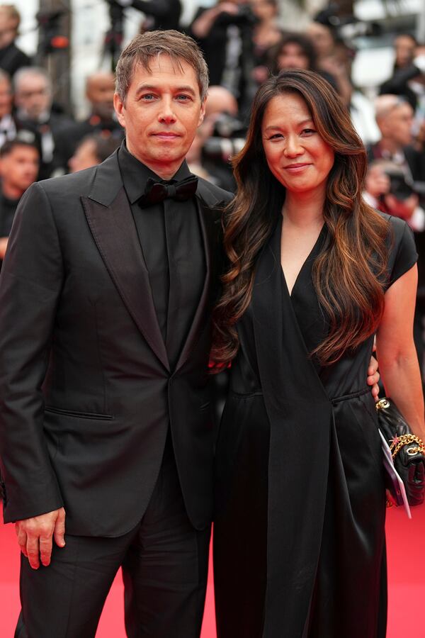 Sean Baker, left, and Samantha Quan pose for photographers during the opening ceremony red carpet of the 78th international film festival, Cannes, southern France, Tuesday, May 13, 2025. (Photo by Scott A Garfitt/Invision/AP)