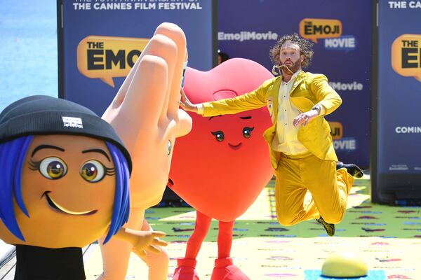 FILE - Actor T. J. Miller poses with characters during the photo call for the film The Emoji Movie, at the 70th international film festival, Cannes, southern France, Tuesday, May 16, 2017. (Photo by Arthur Mola/Invision/AP, File)