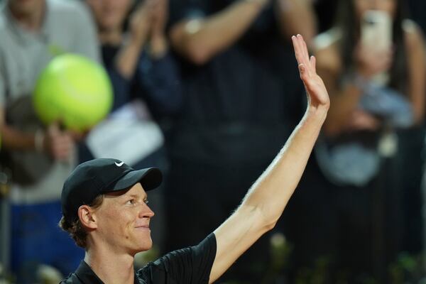 Italy's Jannik Sinner celebrates after a second round match against Argentina's Mariano Navone at the Italian Open tennis tournament in Rome, Saturday, May 10, 2025. (AP Photo/Andrew Medichini)