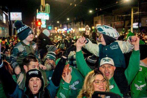 Philadelphia Eagles fans celebrate in Philadelphia after the team defeated the Washington Commanders in the NFC Championship NFL football game Sunday, Jan 26, 2025. (Tom Gralish/The Philadelphia Inquirer via AP)