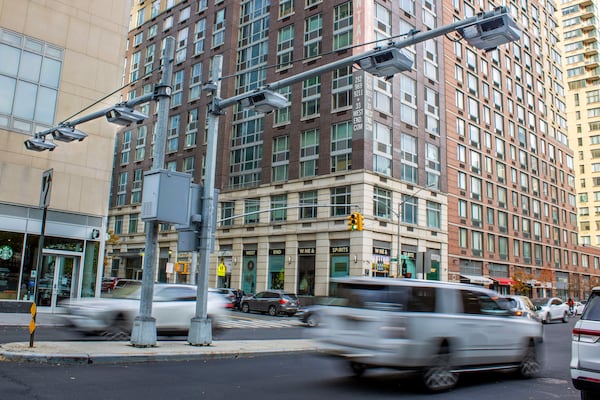 FILE — Toll traffic cameras hang above West End Ave. near 61st Street in the Manhattan borough of New York, Nov. 16, 2023. (AP Photo/Ted Shaffrey, File)