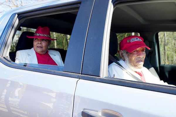 James Meredith, right, who became the first Black student to enroll at the University of Mississippi in 1962, and his wife Judy Alsobrooks Meredith watch the unveiling of a Mississippi Department of Archives and History marker recognizing his birthplace and his legacy in Kosciusko, Miss., Friday, Dec. 20, 2024. (AP Photo/Rogelio V. Solis)