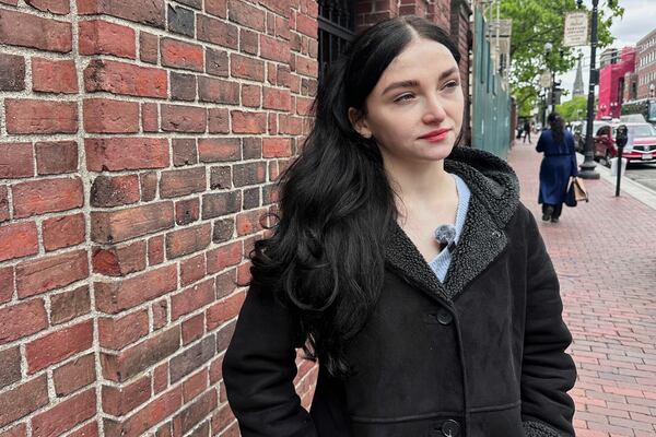 Aleksandra Conevska, a Canadian graduate student studying climate change, speaks about the Trump administration's decision to revoke the school's ability to enroll international students on the Harvard University campus in Cambridge, Mass., on Friday, May 23, 2025. (AP Photo/Michael Casey)