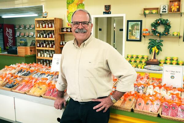 Tom Davidson, the owner of Davidson of Dundee Citrus Candy and Jelly Factory, stands inside his store Tuesday, Feb. 18, 2025, in Lake Wales, Fla. (AP Photo/Marta Lavandier)