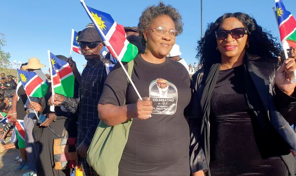 People gather for the state funeral for Namibia's founding president Sam Nujoma at Heroes' Acre, in Windhoek, Namibia, Saturday, March 1, 2025. (AP Photo/Dirk Heinrich)