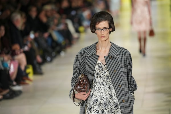 A model wears a creation as part of the Miu Miu Fall/Winter 2025-2026 Womenswear collection presented Tuesday, March 11, 2025. in Paris. (Photo by Scott A Garfitt/Invision/AP)