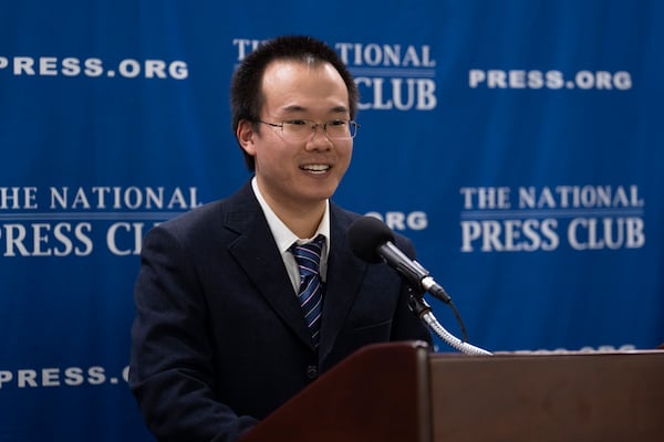 Dong Yifu, the son of imprisoned Chinese veteran journalist Dong Yuyu who was sentenced to seven years in prison on espionage charges, speaks about his father's detention to the National Press Club in Washington, Monday, Feb. 24, 2025. (AP Photo/Ben Curtis)