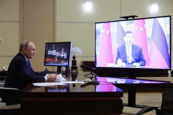 FILE - Russian President Vladimir Putin speaks with Chinese President Xi Jinping via videoconference at Novo-Ogaryovo state residence outside of Moscow, Russia, Tuesday, Jan. 21, 2025. (Gavriil Grigorov, Sputnik, Kremlin Pool Photo via AP, File)