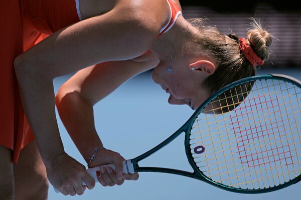 Marta Kostyuk of Ukraine reacts during her third round match against Paula Badosa of Spain at the Australian Open tennis championship in Melbourne, Australia, Friday, Jan. 17, 2025. (AP Photo/Ng Han Guan)