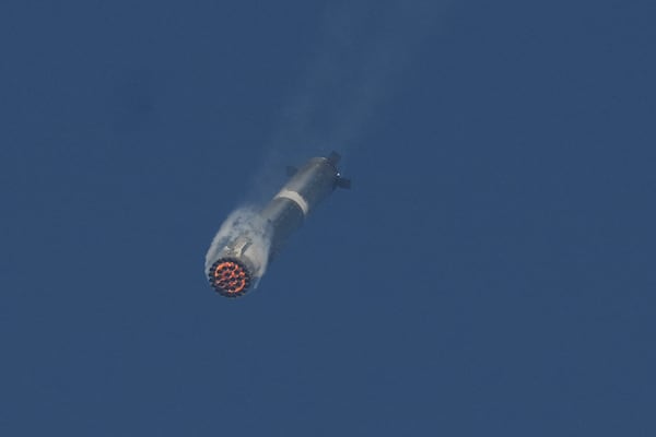 The booster of SpaceX's mega rocket Starship is recaptured during a test flight from Starbase in Boca Chica, Texas, Thursday, March 6, 2025. (AP Photo/Eric Gay)