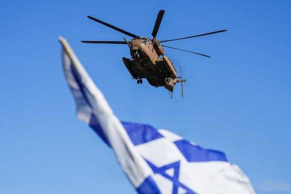 An Israeli military helicopter, carrying the four Israeli female soldier released from Gaza, arrives to the Beilinson hospital in Petah Tikva, near Tel Aviv, Israel, Saturday, Jan. 25, 2025. (AP Photo/Maya Alleruzzo)