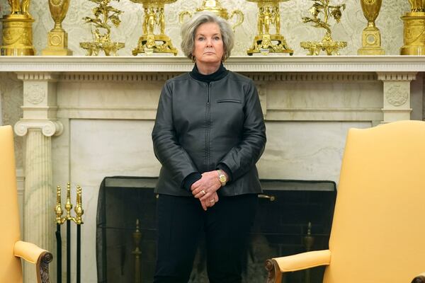 White House chief of staff Susie Wiles is pictured in the Oval Office of the White House as President Donald Trump signs executive orders, Monday, Feb. 3, 2025, in Washington. (AP Photo/Evan Vucci)