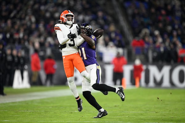 Baltimore Ravens defensive back Brandon Stephens (21) breaks up a pass intended for Cleveland Browns wide receiver Jerry Jeudy (3) during the first half of an NFL football game Saturday, Jan. 4, 2025, in Baltimore. (AP Photo/Nick Wass)