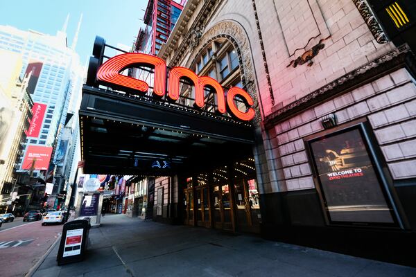 FILE - The AMC Empire 25 theatre appears on 42nd Street in New York on May 13, 2020. (Photo by Evan Agostini/Invision/AP, File)