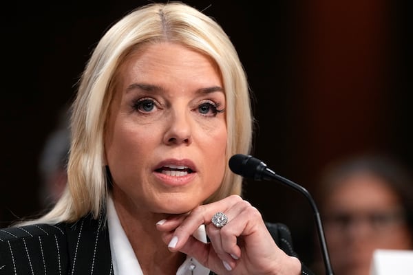 Pam Bondi, President-elect Donald Trump's choice to lead the Justice Department as attorney general, appears before the Senate Judiciary Committee for her confirmation hearing, at the Capitol in Washington, Wednesday, Jan. 15, 2025. (AP Photo/Ben Curtis)