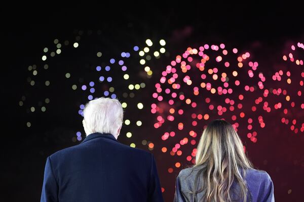 President-elect Donald Trump, Melania Trump and family watch fireworks at Trump National Golf Club, Saturday, Jan. 18, 2025, in Sterling, Va. (AP Photo/Alex Brandon, Pool)