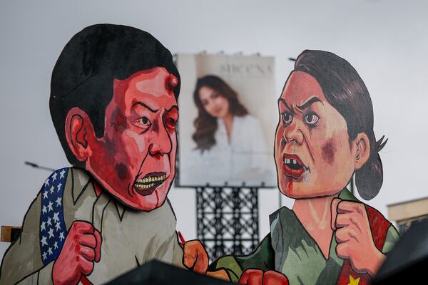 FILE- An effigy of Philippine President Ferdinand Marcos Jr. and Vice President Sara Duterte are displayed during a rally ahead of the third State of the Nation Address by the president in Quezon City, Philippines, Monday, July 22, 2024. (AP Photo/Mark Cristino, File)