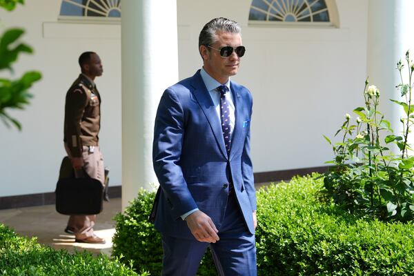 Defense Secretary Pete Hegseth arrives before President Donald Trump speaks during a National Day of Prayer event in the Rose Garden of the White House, Thursday, May 1, 2025, in Washington. (AP Photo/Evan Vucci)