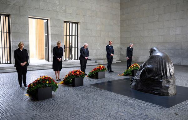 German Federal President Frank-Walter Steinmeier, center, lays a wreath at the Neue Wache, the Federal Republic of Germany's central memorial to the victims of war and tyranny, with representatives of the federal constitutional bodies from left, Anke Rehlinger, Minister-President of Saarland and current President of the Bundesrat, Bundestag President Julia Klöckner, Federal Chancellor Friedrich Merz, and Stephan Harbarth, President of the Federal Constitutional Court, in Berlin, Thursday, May 8, 2025, on the 80th anniversary the Second World War in Europe came to an end. (Bernd von Jutrczenka/dpa via AP)