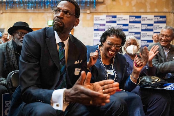 Garlin Gilchrist, left, and Yvonne Posey-Gilchrist, right, the parents of Michigan Lt. Gov. Garlin Gilchrist II, cheer while their son announces his candidacy for governor of Michigan on Tuesday, March 11, 2025, at the Jam Handy in Detroit. (Katy Kildee/Detroit News via AP)