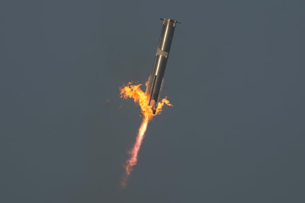 The booster of SpaceX's mega rocket Starship is recaptured during a test flight from Starbase in Boca Chica, Texas, Thursday, March 6, 2025. (AP Photo/Eric Gay)