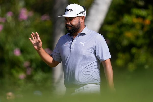 J.J. Spaun reacts after a shot during the final round of the Sony Open golf event, Sunday, Jan. 12, 2025, at Waialae Country Club in Honolulu. (AP Photo/Matt York)