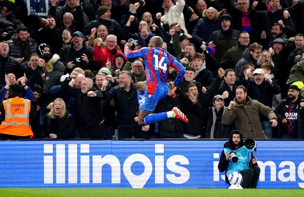 Crystal Palace's Jean-Philippe Mateta celebrates scoring their side's second goal of the game during the English Premier League soccer match between Crystal Palace and Aston Villa at Selhurst Park, London, Tuesday, Feb. 25, 2025. (Zac Goodwin/PA via AP)