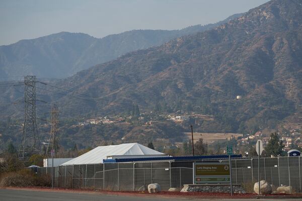 The fenced Lario Park is seen, as it's used by the U.S. Environmental Protection Agency (EPA) temporarily for processing hazardous materials from the Eaton Fire, in Irwindale, Calif., Friday, Jan. 31, 2025. (AP Photo/Damian Dovarganes)