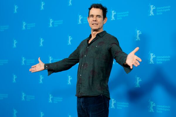 Director Tom Tykwer poses for photographer at the photo call for the film 'Das Licht' at the International Film Festival, Berlinale, in Berlin, Thursday, Feb. 13, 2025. (AP Photo/Markus Schreiber)