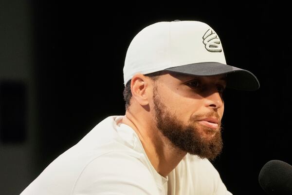 Golden State Warriors guard Stephen Curry speaks during a news conference at the NBA basketball team's facility in San Francisco, Thursday, May 15, 2025. (AP Photo/Jeff Chiu)