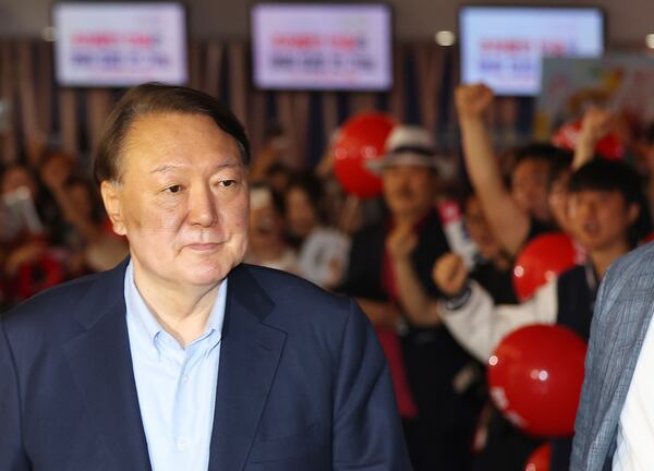 Former President Yoon Suk Yeol arrives at a cinema to watch the documentary movie in Seoul, South Korea, on May 21, 2025. (Kim Do-hoon/Yonhap via AP)