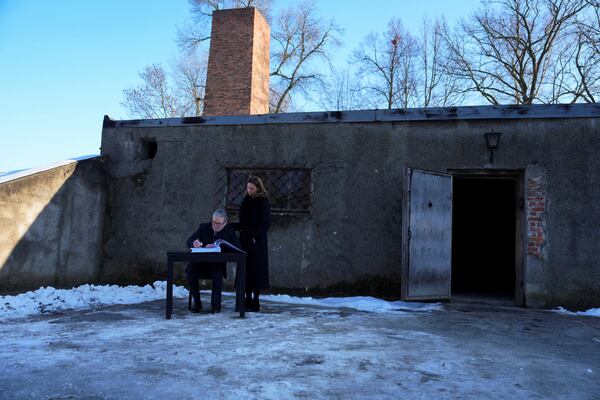 Britain's Prime Minister Keir Starmer and his wife Victoria Starmer visit the Memorial And Museum Auschwitz-Birkenau, a former Nazi German concentration and extermination camp, in Oswiecim, Poland, Friday Jan. 17, 2025. (Aleksandra Szmigiel/Pool via AP)