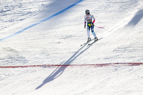 United States' Lindsey Vonn arrives at the finish area after crashing during a women's Super-G, at the Alpine Ski World Championships, in Saalbach-Hinterglemm, Austria, Thursday, Feb. 6, 2025. (Jean-Christophe Bott/Keystone via AP)