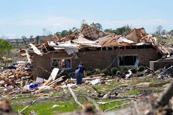 A home is destroyed after a severe storm passed the area on Saturday, May 17, 2025, in London, Ky. (AP Photo/Carolyn Kaster)