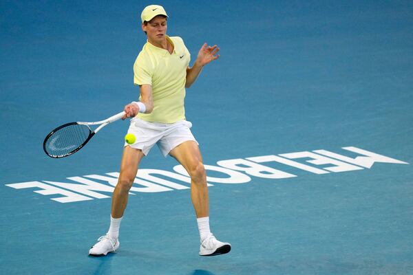 Jannik Sinner of Italy plays a forehand to Alexander Zverev of Germany during the men's singles final at the Australian Open tennis championship in Melbourne, Australia, Sunday, Jan. 26, 2025. (AP Photo/Vincent Thian)