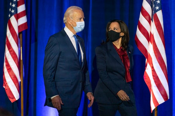 FILE - Democratic presidential candidate former Vice President Joe Biden, left, and Democratic vice presidential candidate Sen. Kamala Harris, D-Calif., arrive before Biden speaks, Nov. 6, 2020, in Wilmington, Del. (AP Photo/Carolyn Kaster, File)