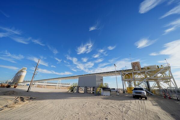 A general view shows Atlas Energy, at the beginning of a 42-mile conveyor belt that carries sand needed for hydraulic fracturing Wednesday, Feb. 26, 2025, in Kermit, Texas. (AP Photo/Julio Cortez)