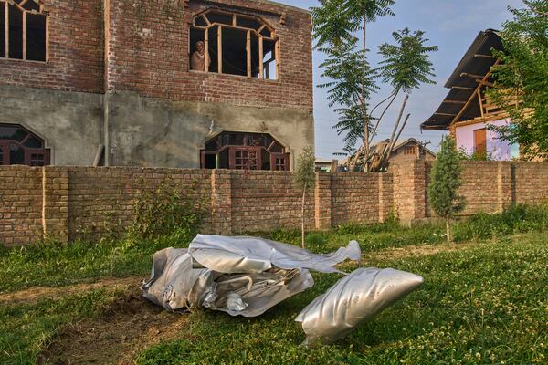 Debris of an aircraft lie in the compound of a mosque at Pampore in Pulwama district of Indian controlled Kashmir, Wednesday, May 7, 2025. (AP Photo/Dar Yasin)