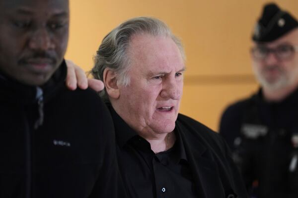 Actor Gerard Depardieu returns to the courtroom after a break for his trial for the alleged sexual assaults of two women on a film set in 2021, Tuesday, March 25, 2025 in Paris. (AP Photo/Aurelien Morissard)