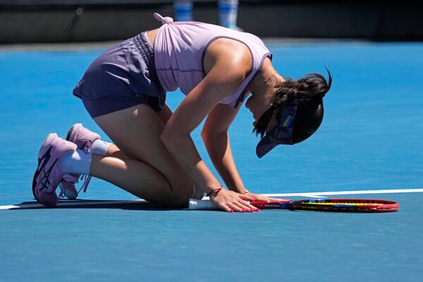 Eva Lys of Germany celebrates after defeating Jaqueline Cristian of Romania in their third round match at the Australian Open tennis championship in Melbourne, Australia, Saturday, Jan. 18, 2025. (AP Photo/Vincent Thian)